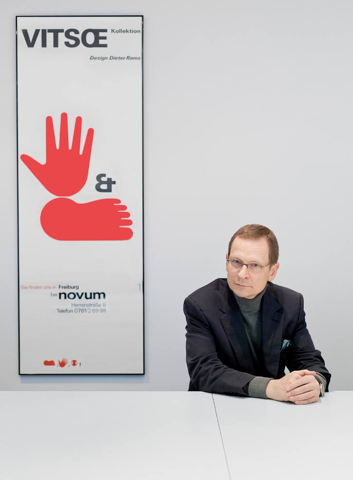 Mark Adams in front of a historic Vitsœ poster.